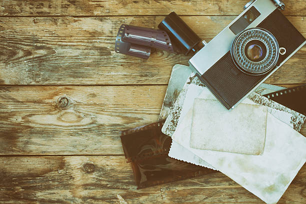 istock vintage camera, film and photographs 545579420