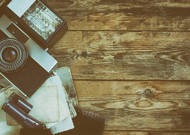 istock vintage camera, film, photographs, flash 545579484