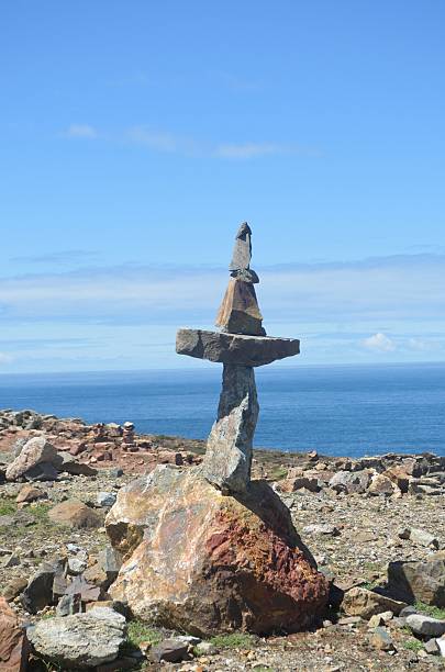 istock Stone cross with Blue sky and sea 545580056