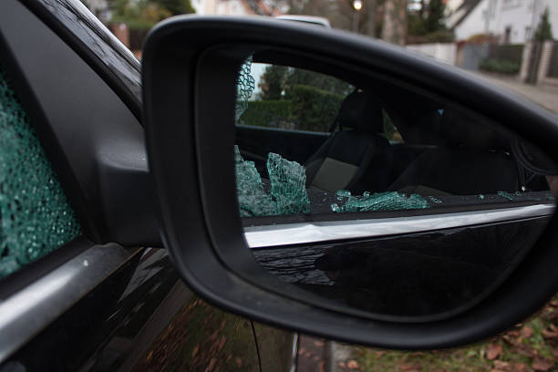 istock Car break-in broken side window through the rear-view mirror 545580420