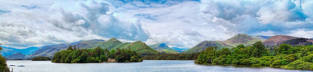 Catbells Across Derwent Water In the Lake District A view from Keswick in Cumbria across Derwent Water to Catbells - one of the most popular fells of the English Lake District. derwent water stock pictures, royalty-free photos & images
