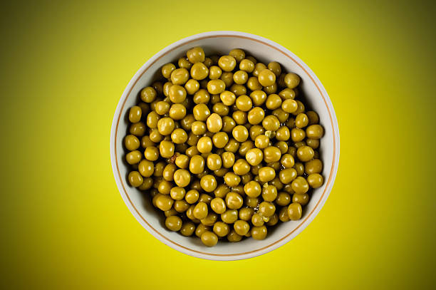 istock green peas in the bowl 545583274