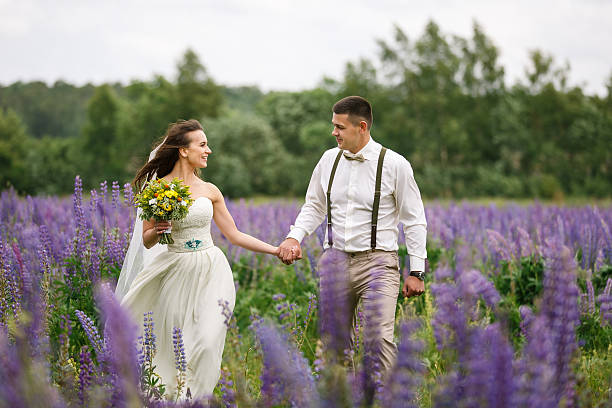 istock Happy wedding couple in lupin 545583874