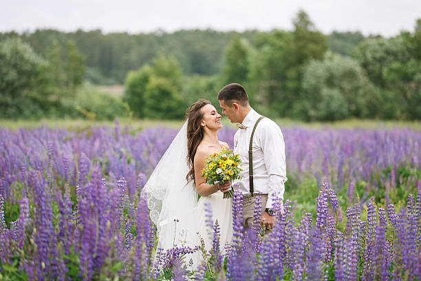 istock Happy wedding couple in lupin 545584104