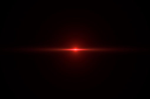 Destello de lente roja sobre fondo negro - Alta resolución photo