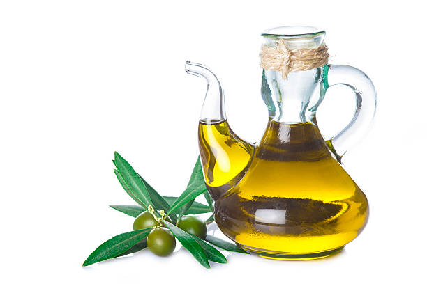 istock Extra virgin olive oil bottle isolated on white 545586270