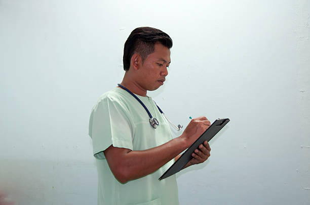 istock Doctor writing a medical prescription 545587110