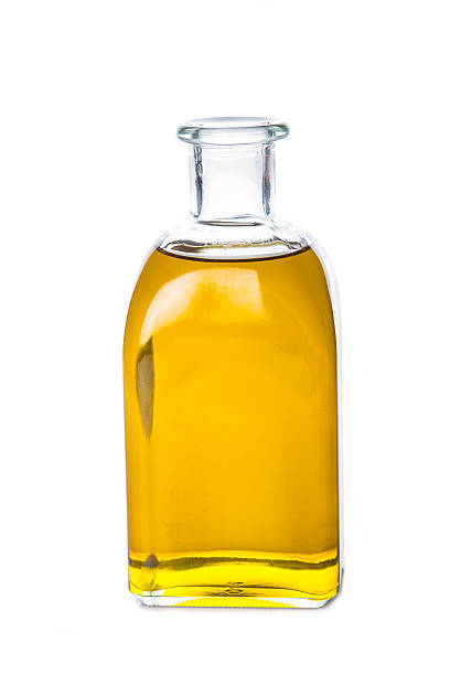 istock Olive oil bottle isolated on a white backgroun 545587512