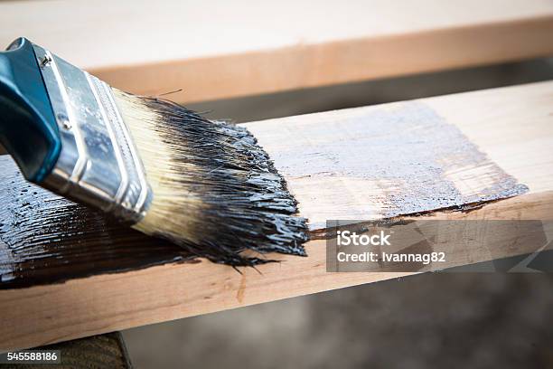 Varnishing Natural Wood With Paint Brush Wood Texture Stock Photo - Download Image Now