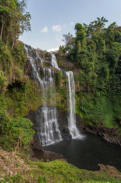 istock Raging water flowing down waterfall during rainy season showing 545588570