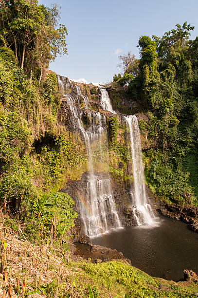 istock Raging water flowing down waterfall during rainy season showing 545590400