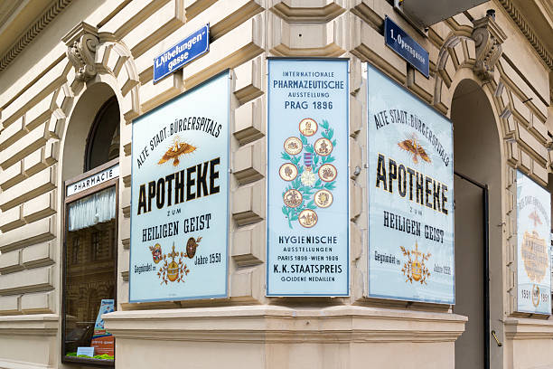 Vienna, Austria - May 23, 2016: Signs on facade of Holy Ghost pharmacy (old hospital) on Operngasse in Vienna, Austria