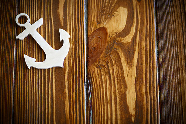 istock Wooden nautical anchor 545592118