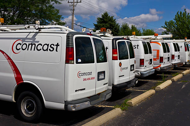 comcast service vehicles iv - nbc imagens e fotografias de stock