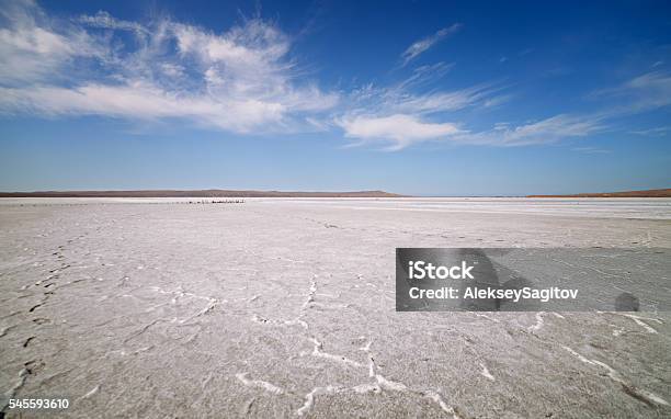 Dry Lake Under Blue Sky Stock Photo - Download Image Now - Backgrounds, Badlands, Bed - Furniture