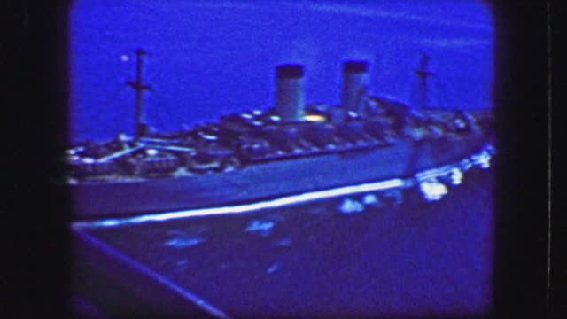1944: Helicopter flyover of USS General William Mitchell (AP-114) troopship at sea.