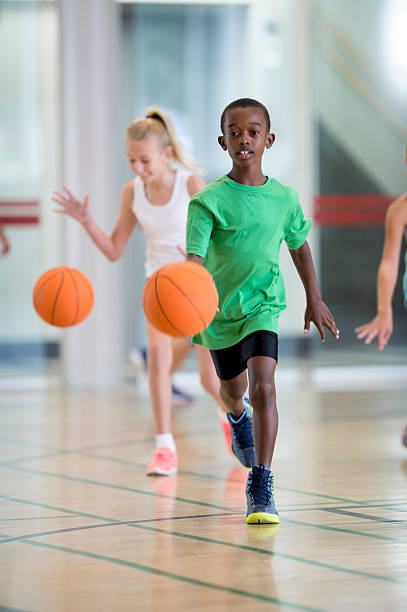 istock Dribbling a Ball During Recess 545634740