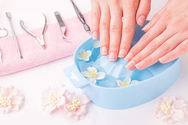 istock Woman hands in bath with water 545634932