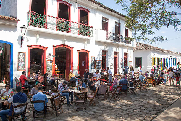 Old Town of Paraty - Brazil Paraty, Brazil - July 1, 2016:  Cafes filled with people during FLIP International Literary Event  in the Old Town of Paraty (state of Rio de Janeiro).  paraty brazil stock pictures, royalty-free photos & images