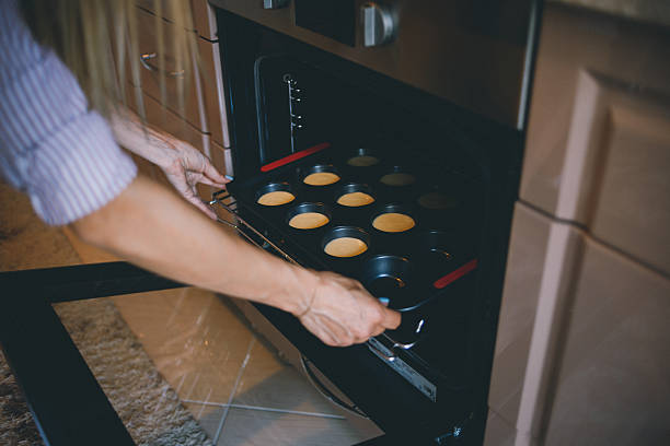 istock Young woman chef cooking cake in kitchen 545636760