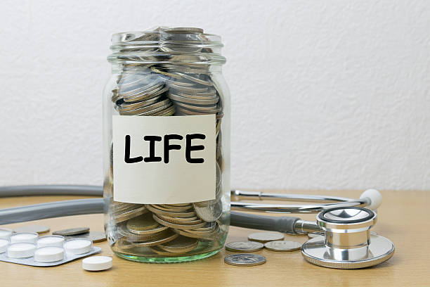 istock Money saving for life in the glass bottle 545637372