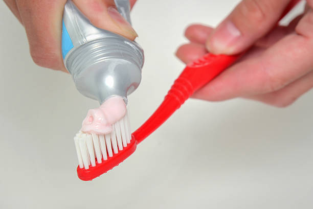 istock toothpaste and brush closeup, dental care concept 545638822