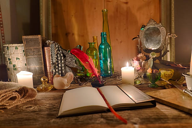 magische einstellung - candle mythology book literature stock-fotos und bilder