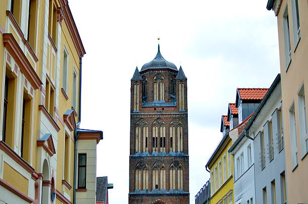part of large catherdral and cloudy sky in stralsund, germany