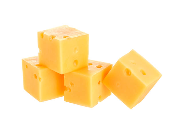 istock Cubes of cheese isolated on white 545645904