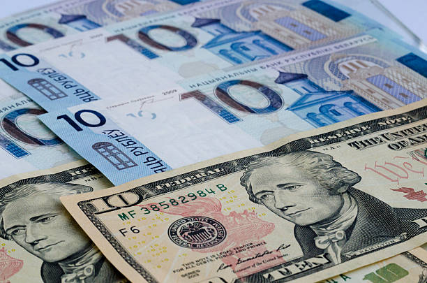 istock Belarusian and American money 545646038