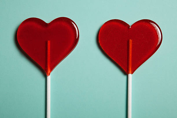 istock Two lollipops. Red hearts. Candy. Love concept. Valentine day. 545646322