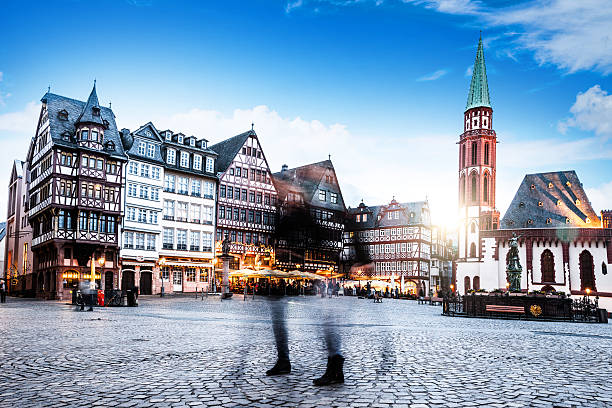 istock People in Frankfurt old town at dusk 545646846