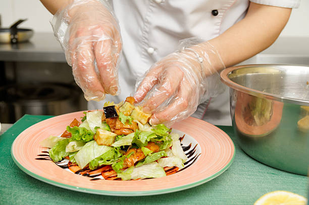 chef is cooking appetizer - voedselveiligheid stockfoto's en -beelden