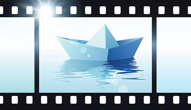 Photo film with origami boat. Paper ship on water Photo film with origami boat. Vector illustration of paper ship on water perforated paper pictures stock illustrations