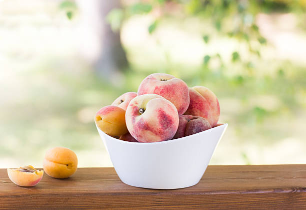 istock bowl of delicious peaches 545652110