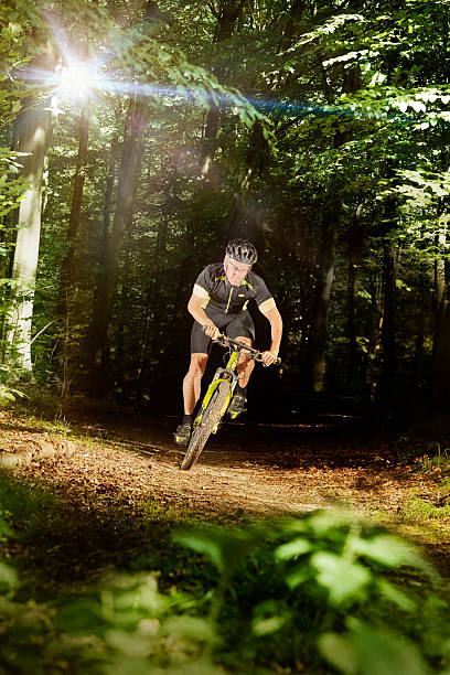 istock Mountain Biking and lense flare 545653128