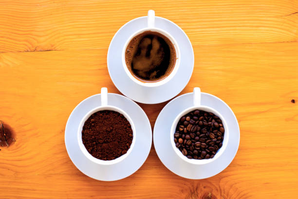 istock Cup of coffee and coffee beans viewed from directly above 545654354