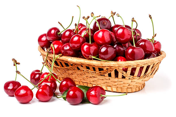 istock cherries in a wicker basket isolated on white background 545654818