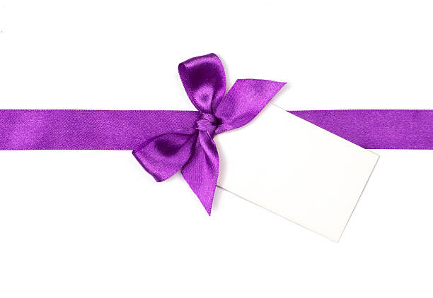 istock Purple ribbon with bow and card 545655158