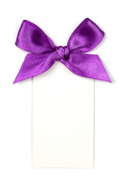 istock Purple ribbon with bow and card 545655428