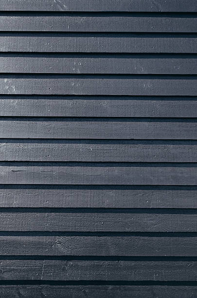 istock Black painted barnwood pine planks traditional norwegian sidind 545656012