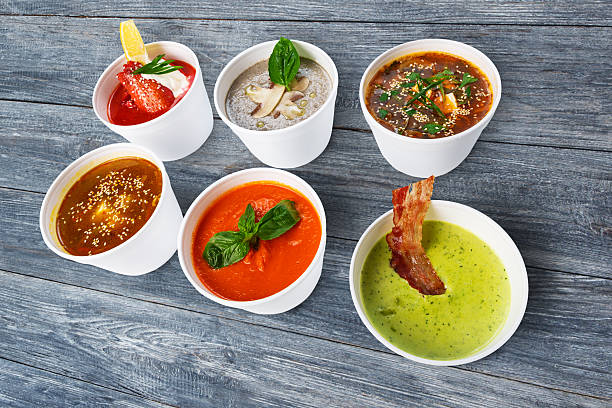 istock Variety of soups from different cuisines at blue wood 545656450