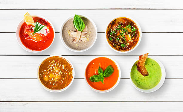 istock Variety of soups at white wood, top view 545656606