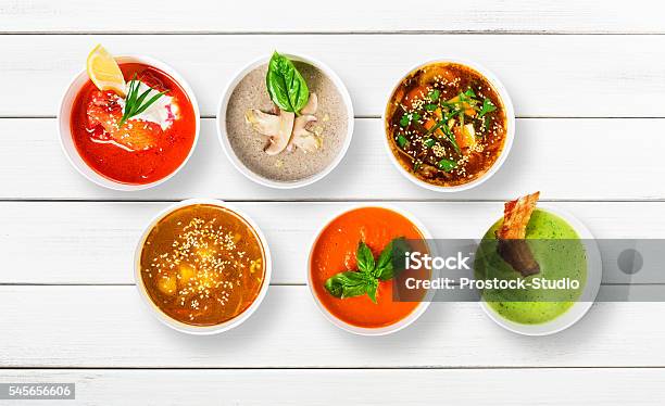 Variety Of Soups At White Wood Top View Stock Photo - Download Image Now - Soup, Variation, East Asian Culture