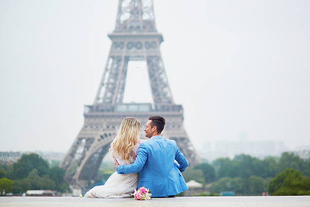 istock Just married couple near the Eiffel tower in Paris 545657194