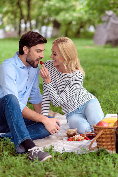 istock Loving couple dating in park 545657658