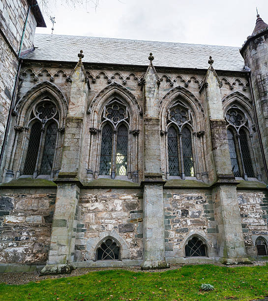 Fragment of famous Stavanger Domkirke on dull spring day. Fragment of famous Stavanger Domkirke on dull spring day. stavanger cathedral stock pictures, royalty-free photos & images
