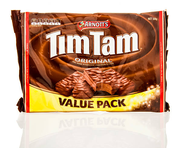 Arnotts Tim Tam Winneconne, United States - July 8, 2016: Package of Arnott's Tim Tam on an isolated background. Tim Tam stock pictures, royalty-free photos & images