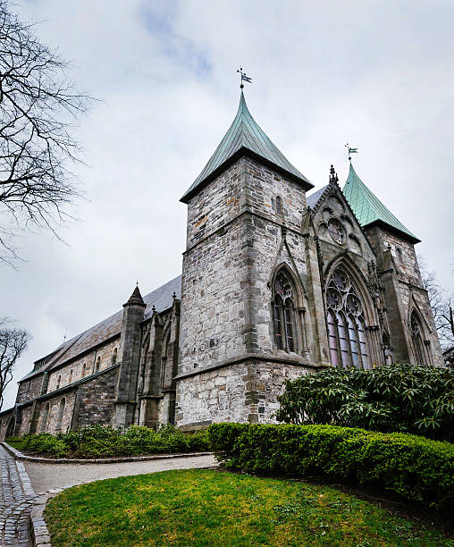 Fragment of famous Stavanger Domkirke on dull spring day. Exterior of the famous Stavanger Domkirke on cloudy spring day stavanger cathedral stock pictures, royalty-free photos & images