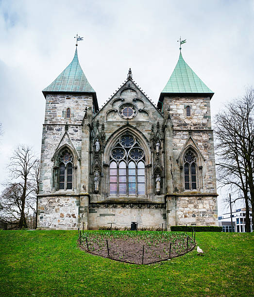 Fragment of famous Stavanger Domkirke on dull spring day. Exterior of the famous Stavanger Domkirke on cloudy spring day stavanger cathedral stock pictures, royalty-free photos & images